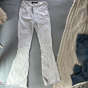 White flare jeans.